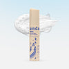 Tube of 'uncap' Rewind Age Defying face cleanser with a blue label on a light blue background.