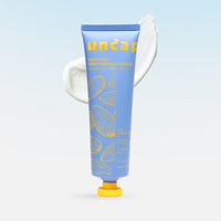 Lotion of 'uncap' everyday moisturizing lotion on a light blue background