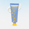 Blue lotion tube with yellow text and design on a light blue background